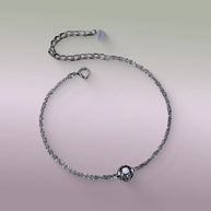 Delicate 1ct moissanite adjustable bracelet on wrist, showcasing thin silver chain