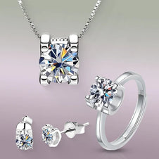 4pc Moissanite Jewelry Set – 1 Carat Each in 18K White Gold, showcasing timeless elegance and brilliance.